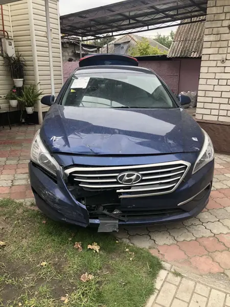 Dark sedan: front view