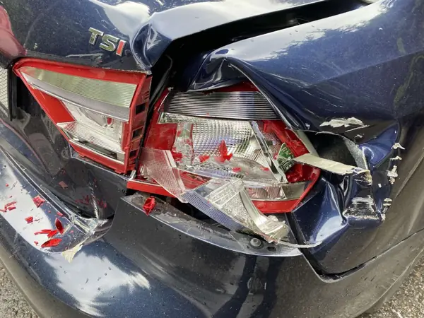 Damaged rear light and boot lid