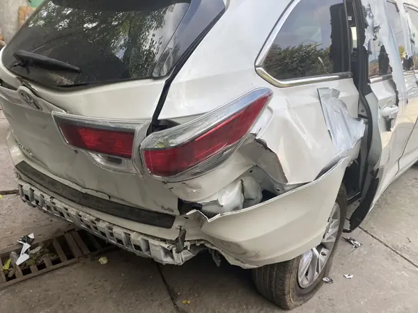 White crossover: rear corner damage