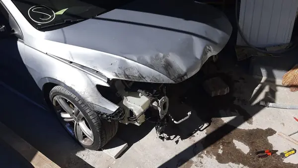 Damaged bonnet and wing