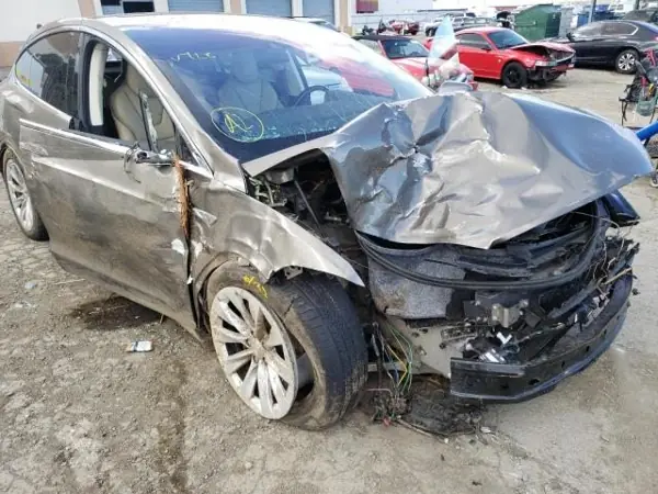 Minivan with damage to the front of the body